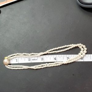 Vintage 2 strand 3-5 mm pearl necklace little wear on clasp gritty when rubbed